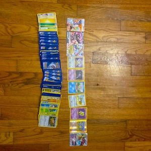300 Pokémon cards.All in middle to good conditions. 54 trainers, and two tokens